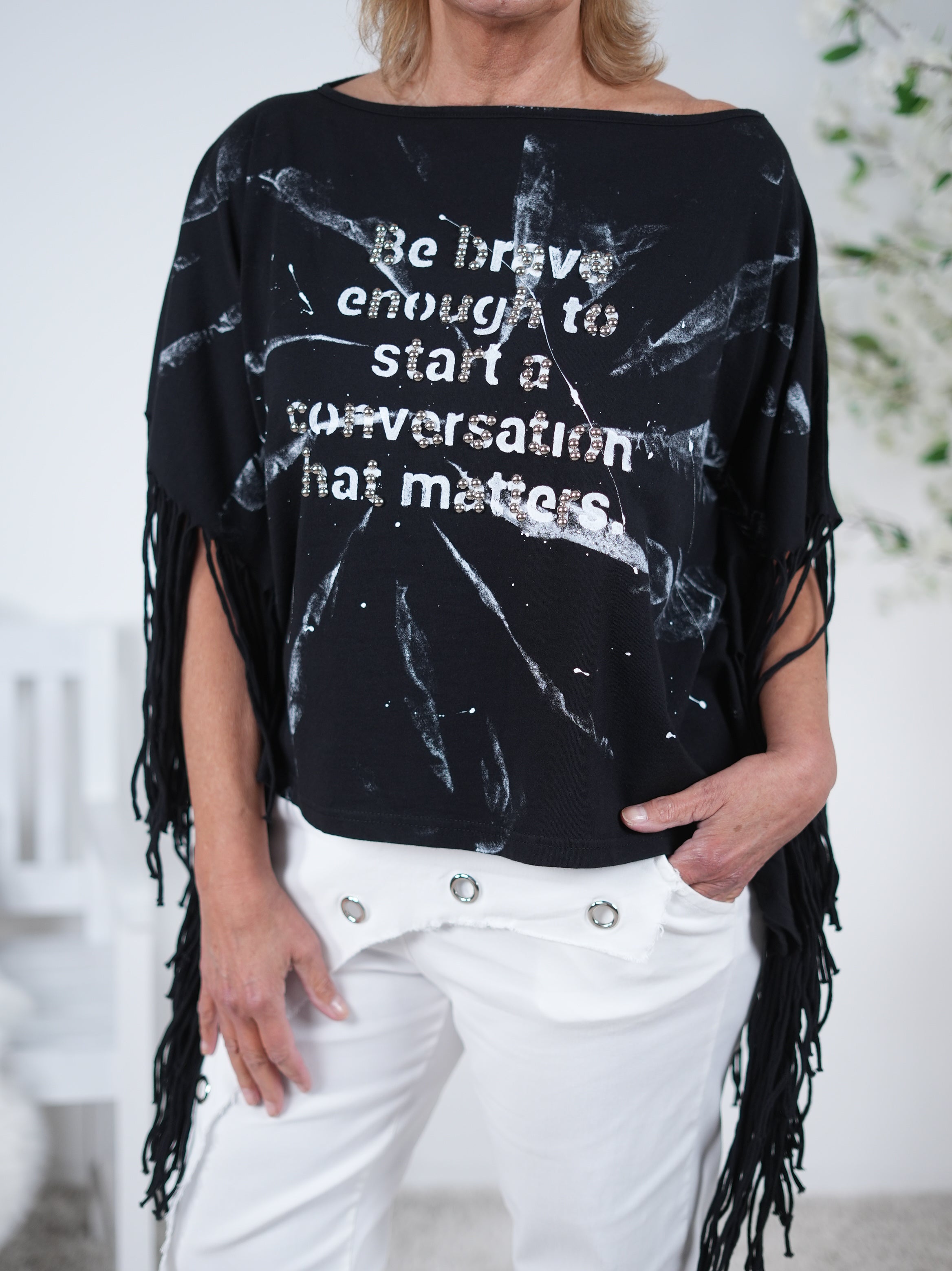 ausgefallener Poncho mit Fransen