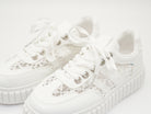 Sneaker mit Details aus Spitze