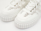 Sneaker mit Details aus Spitze