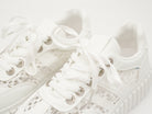 Sneaker mit Details aus Spitze