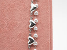 Edelstahlhalskette mit Herz- & Perlendetails