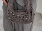 Cross Bag mit Nieten verziert