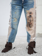 ausgefallene Hose mit Jeans Elementen und großem Motiv