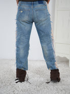 ausgefallene Hose mit Jeans Elementen und großem Motiv