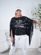 ausgefallener Poncho mit Fransen
