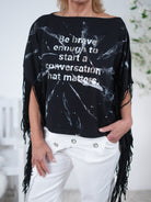 ausgefallener Poncho mit Fransen