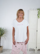 lässiges Shirt mit Smile Schriftzug in Strasssteinen