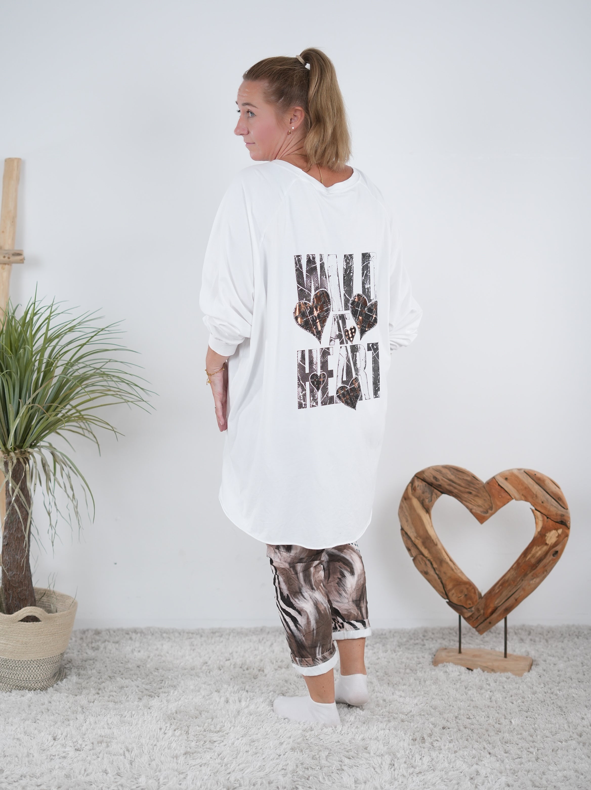 Langarm Shirt mit Ärmelbündchen im Vokuhila Schnitt Weiß