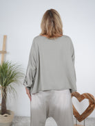 langarm Shirt mit Schriftzug und überschnittenem Arm