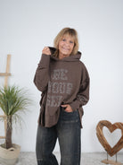 oversize Hoody mit großem Leo Print und Ärmelbündchen Schoko