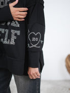 oversize Hoody mit großem Leo Print und Ärmelbündchen