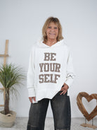oversize Hoody mit großem Leo Print und Ärmelbündchen Weiß