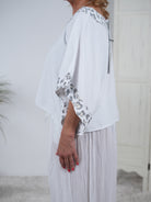 Poncho Shirt mit Leo Akzenten