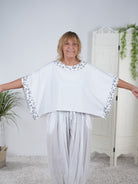 Poncho Shirt mit Leo Akzenten